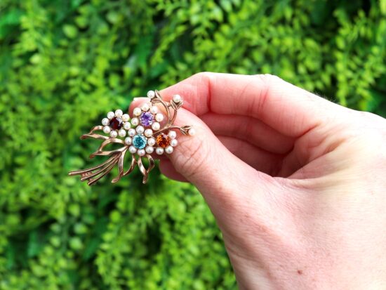 floral gemstone brooch