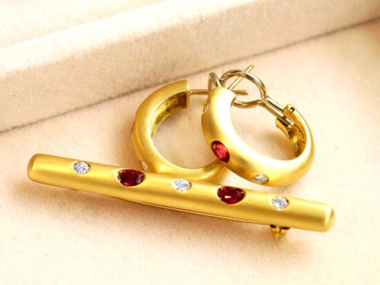 ruby and diamond brooch and earring set