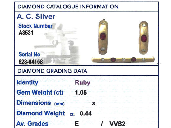 ruby and diamond brooch and earring set grading card