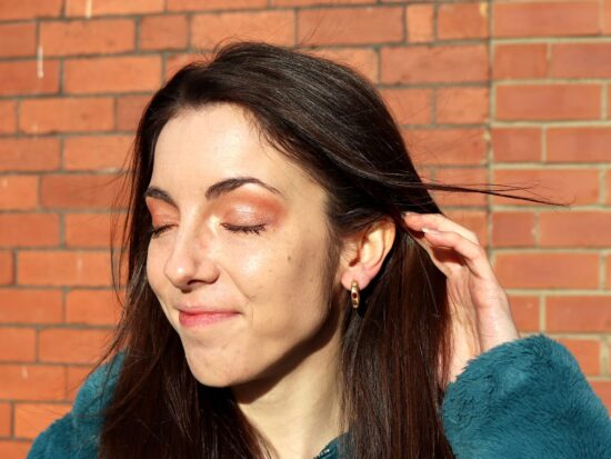 wearing ruby and diamond earring