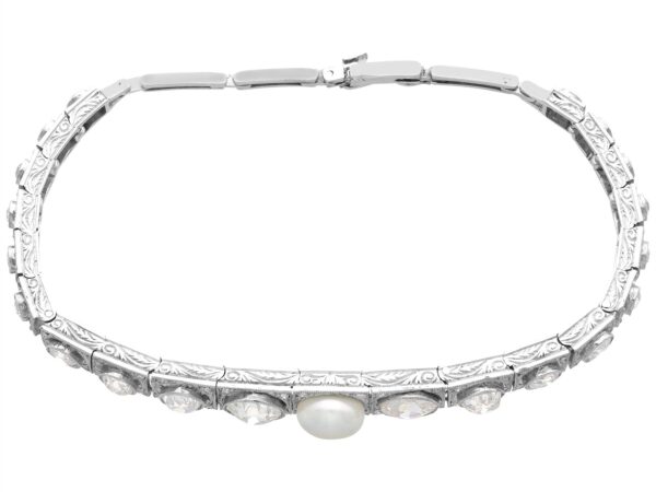 side of antique pearl and diamond line bracelet