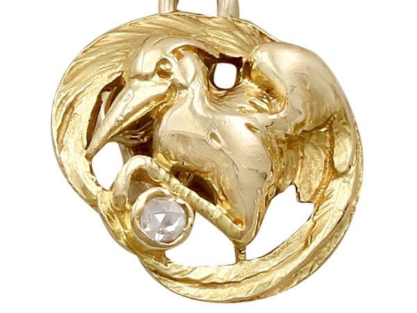 close up of bird cufflinks
