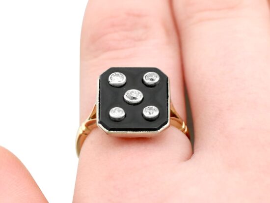 Onyx and Diamond Ring on finger