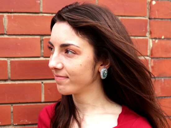 White Gold Earrings Being Worn