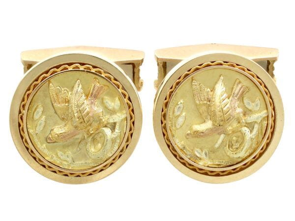 gold bird cufflinks