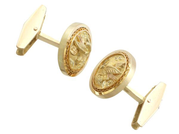 whale back gold bird cufflinks