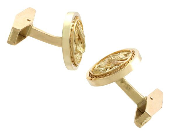 18k gold bird cufflinks
