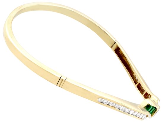 Emerald and Diamond Bangle in Yellow Gold side
