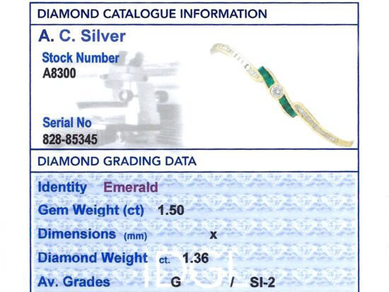 Emerald and Diamond Bangle in Yellow Gold grading card