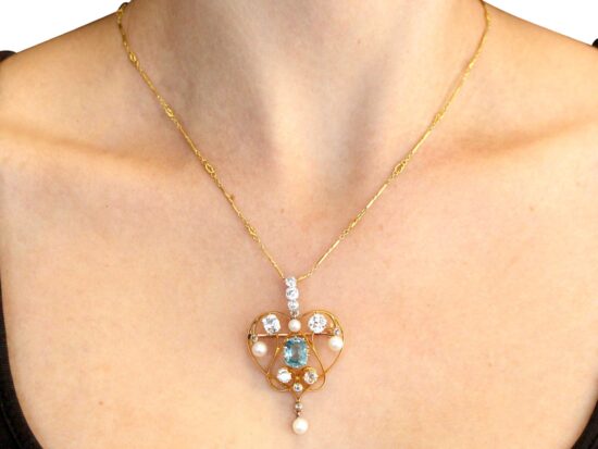 Aquamarine Pendant Brooch in Gold wearing