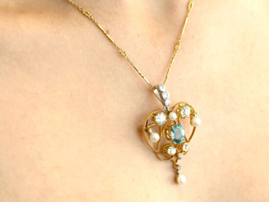 Aquamarine Pendant Brooch in Gold wearing