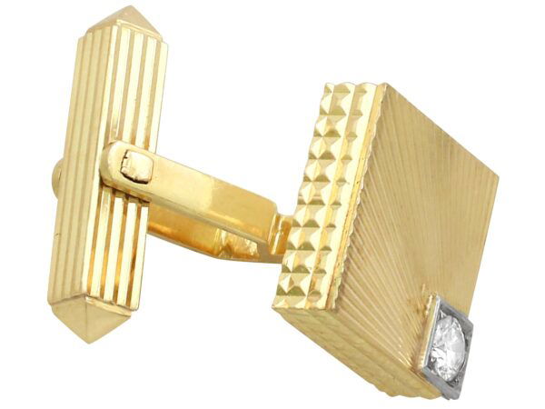 gold square cufflink with diamond