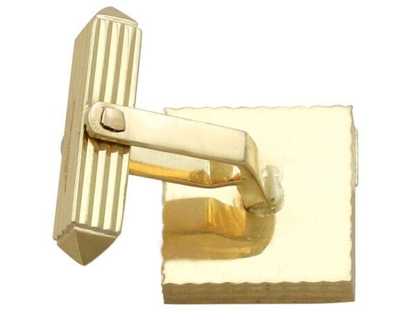 back of gold square cufflink