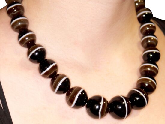 Agate Necklace Being Worn Closeup