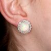 Opal Earrings On Ear Closeup