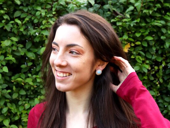 Antique Opal Earrings Being Worn
