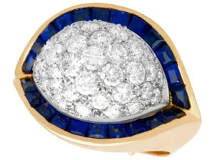 unusual gold sapphire and diamond ring