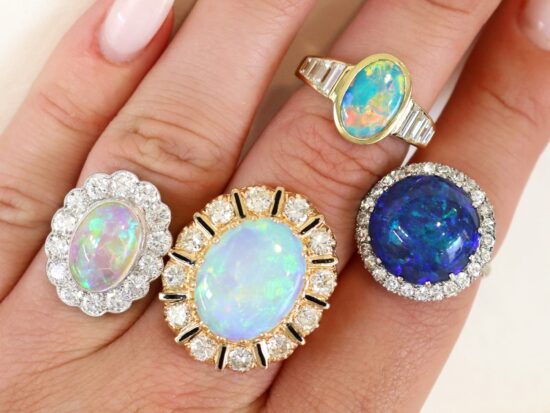 Gemstone and Diamond Rings on Hand