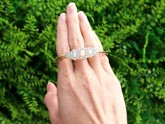 Victorian opal and diamond yellow gold bangle outside