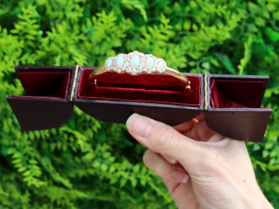 Victorian opal and diamond yellow gold bangle boxed outside