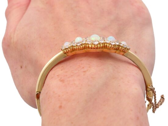 Victorian opal and diamond yellow gold bangle wearing