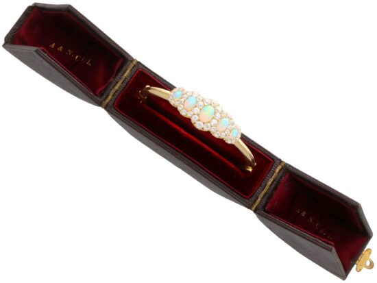 boxed Victorian opal and diamond yellow gold bangle