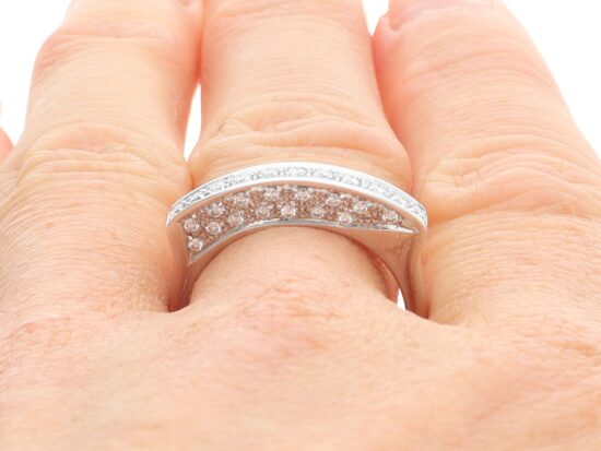 Unusual Half Eternity Ring in White Gold on finger