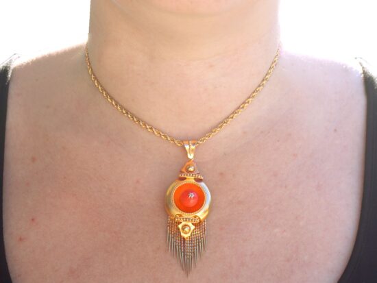 Wearing Coral Diamond Necklace