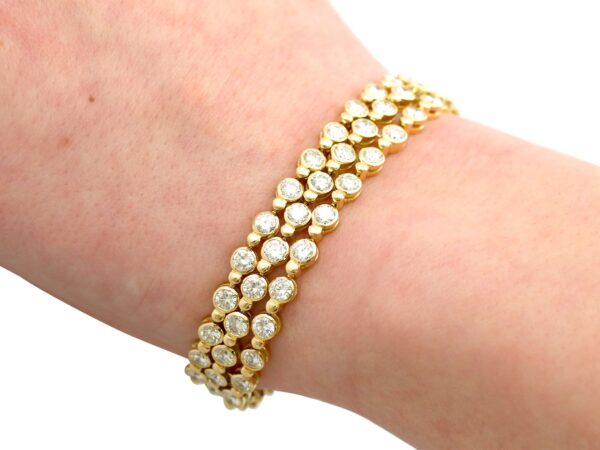 vintage gold diamond bracelet on wrist