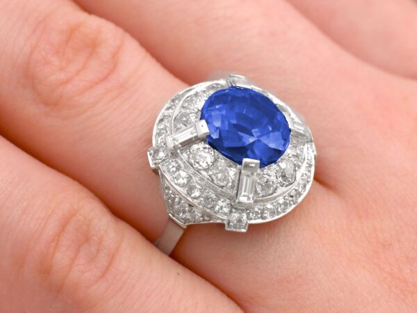 art deco sapphire cocktail ring on hand