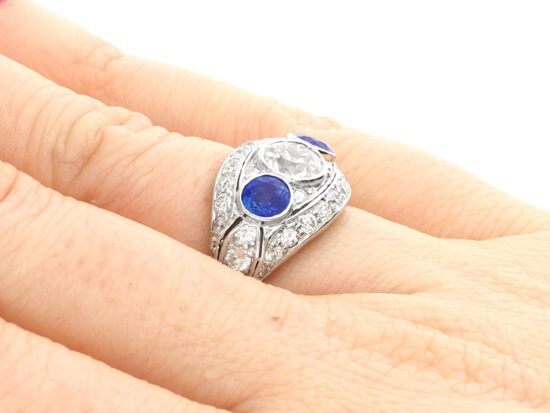 1930's sapphire and diamond cocktail ring on finger