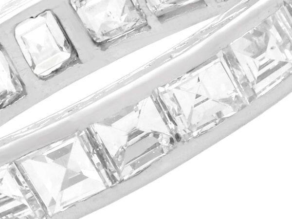 close up of princess and baguette cut eternity ring