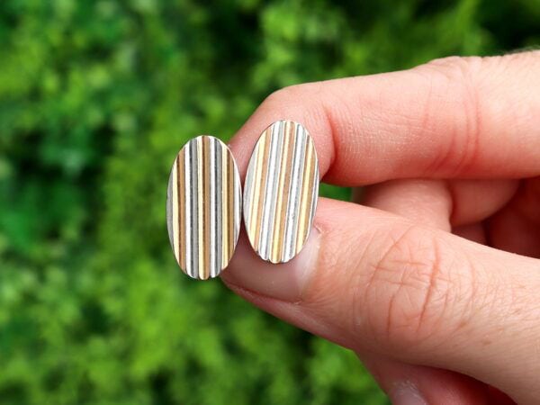 gold and platinum oval cufflink