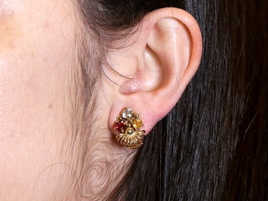 Gemstone Earrings Being Worn Closeup