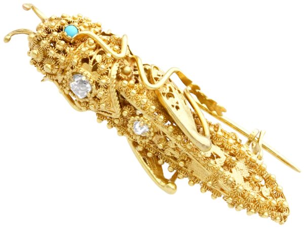 antique gold grasshopper brooch with turquoise and diamonds