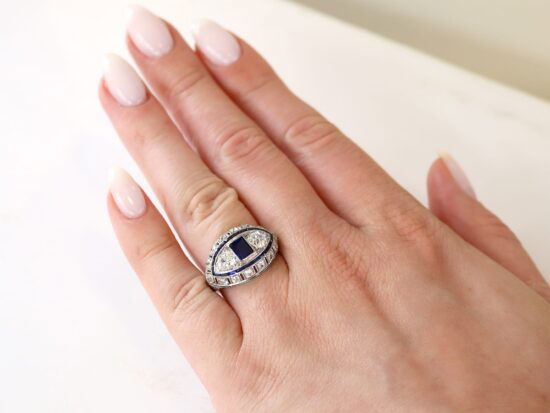wearing French platinum sapphire and diamond ring