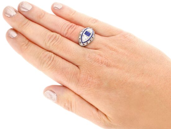 French platinum sapphire and diamond ring on hand