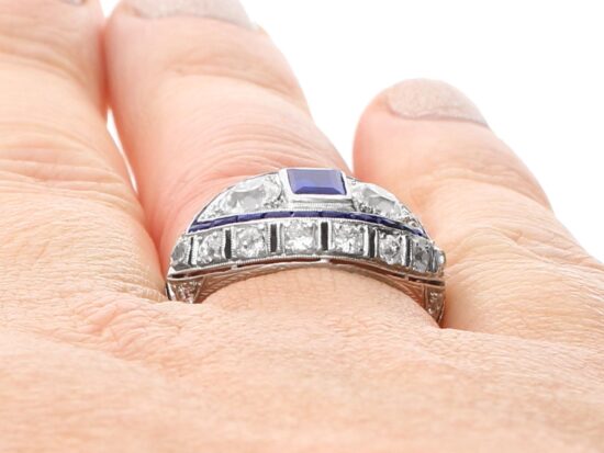 French platinum sapphire and diamond ring on hand