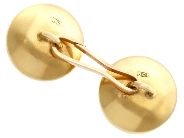 reverse of Victorian dog cufflink in gold