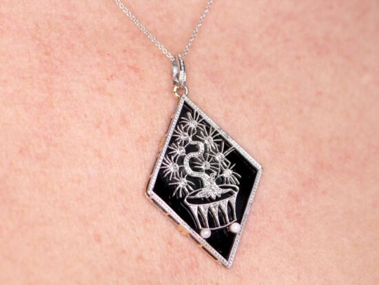 wearing Onyx Panel Pendant with Diamonds