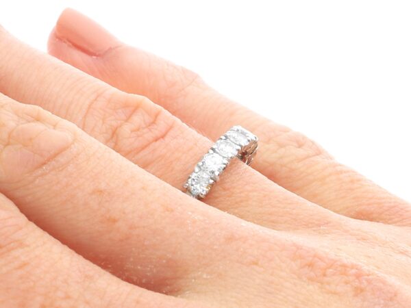 Platinum Eternity Ring with Diamonds on hand