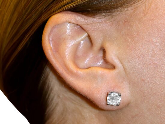 Diamond Stud Earrings Being Worn