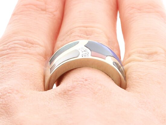 vintage gold and gemstone ring on finger