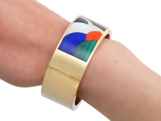 vintage gold and gemstone bangle on wrist