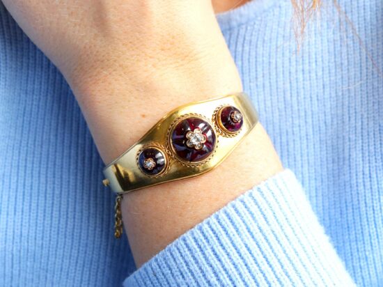 wearing garnet bangle