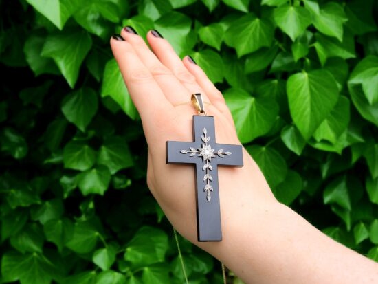 Onyx and Diamond Cross Pendant Necklace outside