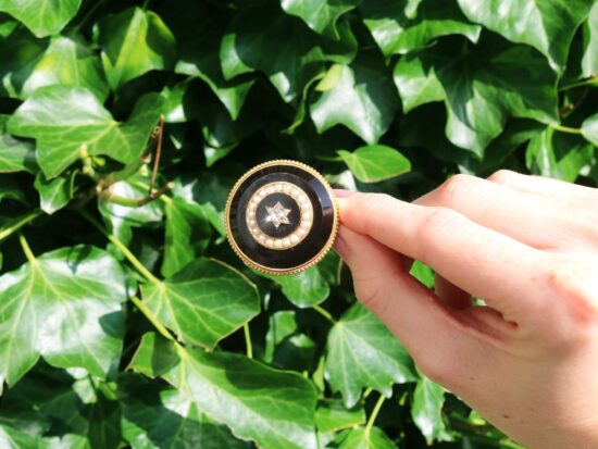 Victorian Onyx Brooch with Diamonds outside