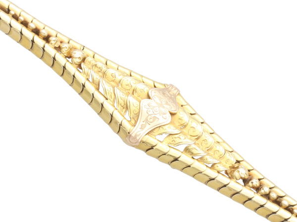 Engraved Gold Link Detail Close-Up