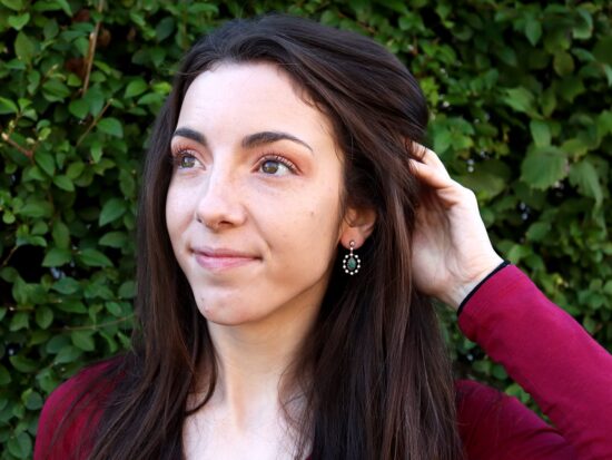 Black Opal Earrings Being Worn