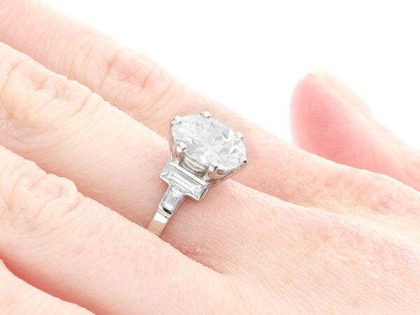 1930s diamond solitaire ring on finger